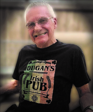 MERLE L. DUGAN